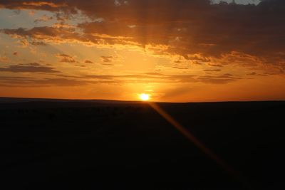 Scenic view of silhouette landscape against sky during sunset