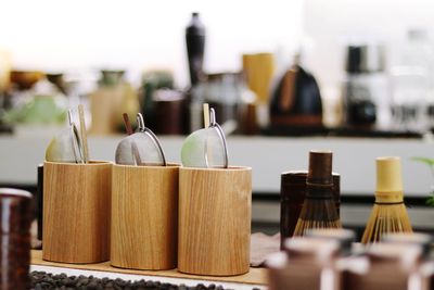 Close-up of wine bottles on table