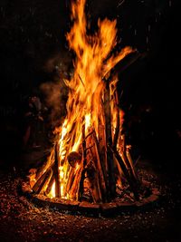 Bonfire on field at night