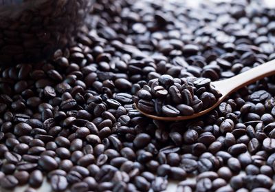 Close-up of coffee beans on table