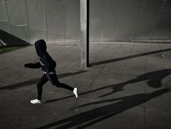 Shadow of woman on wall