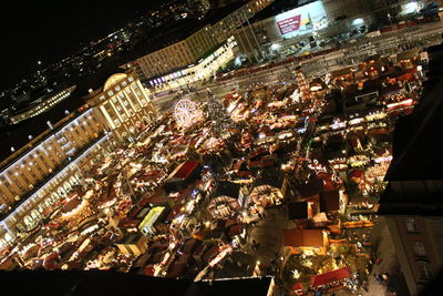 High angle view of people in city at night