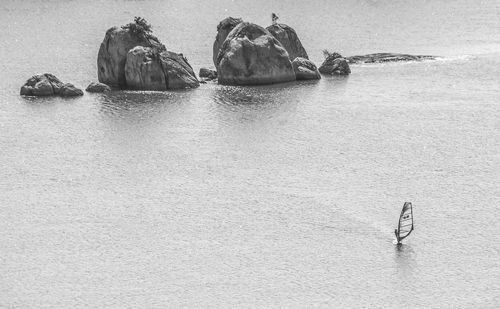 People swimming in sea
