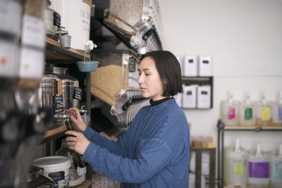 Woman working in organic shop