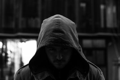 Portrait of man in hooded shirt