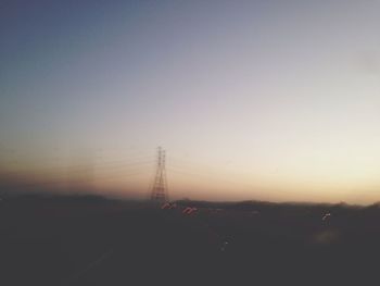 Electricity pylons on landscape