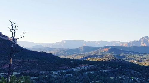 Scenic view of mountains against clear sky