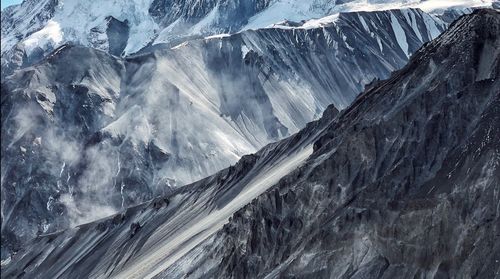 Scenic view of snowcapped mountains during winter