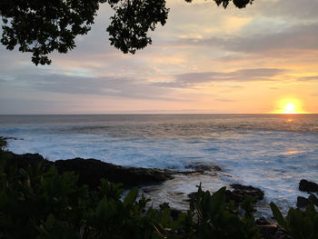 Scenic view of sea against sky during sunset