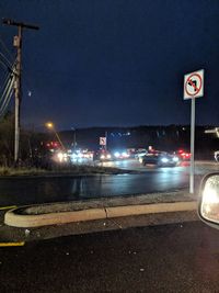 Cars on street at night