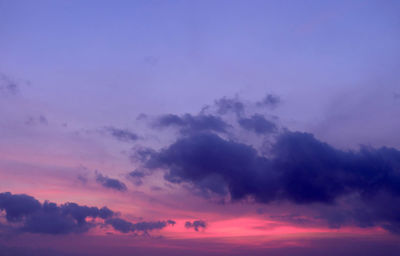 Low angle view of dramatic sky during sunset