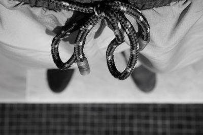 Close-up of rope tied to metal