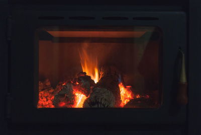 Close-up of fire burning at night