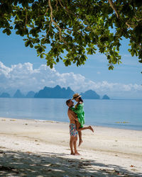 Romantic couple enjoying at beach during vacation