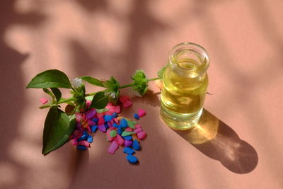 High angle view of candies in glass on table