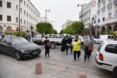 People walking on city street