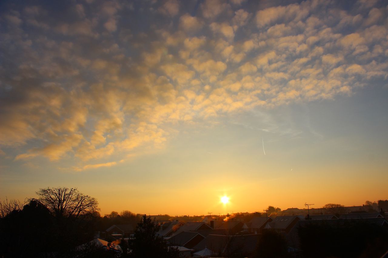 sky, sunset, tree, cloud - sky, orange color, plant, beauty in nature, nature, architecture, scenics - nature, no people, building exterior, sun, built structure, sunlight, silhouette, building, outdoors, tranquility, idyllic, lens flare