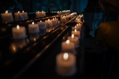 Light trails on illuminated building at temple