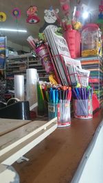 Multi colored bottles on table in restaurant