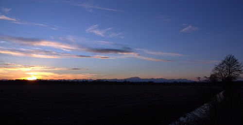 Landscape against sky during sunset