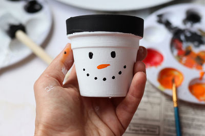 Snowman painted clay pot