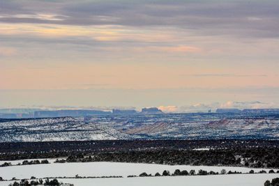 Scenic view of sea against sky during winter