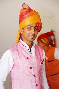 Portrait of young man wearing turban