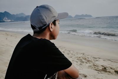 Rear view of man on beach