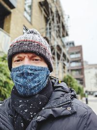 Portrait of man in snow