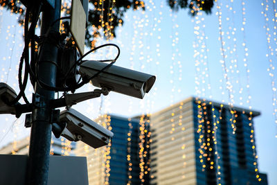 Low angle view of illuminated light on city