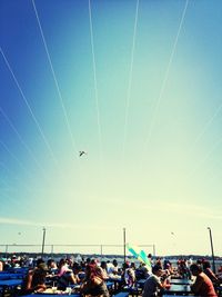 Low angle view of ferris wheel against clear sky