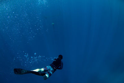 Man swimming in sea