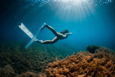 Man swimming in sea