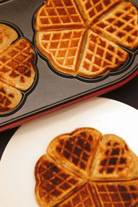 Close-up of cookies in plate on table