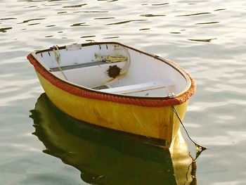 Close-up of boat moored in water