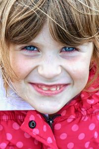 Close-up portrait of a smiling girl
