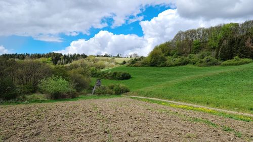 Scenic view of land against sky