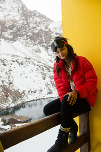 Happy female skier takes in the view