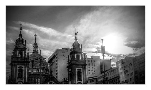 Low angle view of church against cloudy sky