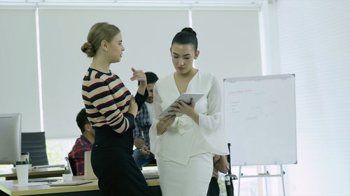 Young woman using smart phone