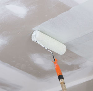 High angle view of snow on metal container