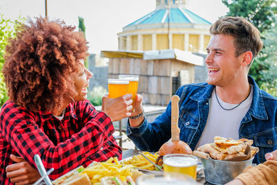 Portrait of young woman having food