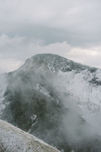 Scenic view of volcanic mountain against sky