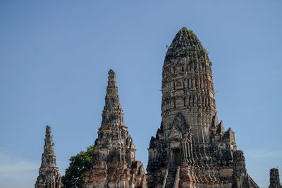 Low angle view of old temple building against clear sky