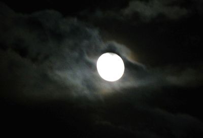 Low angle view of moon against sky at night