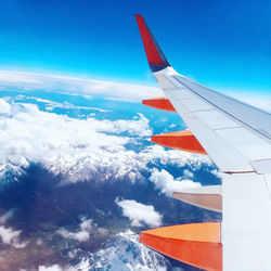 Airplane wing against sky