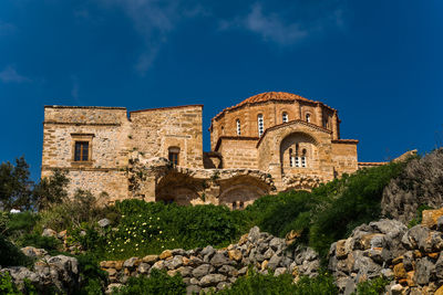 View of historical building against blue sky