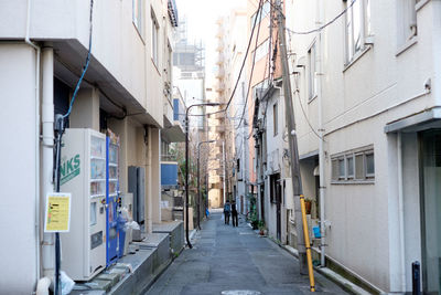 Narrow alley along buildings