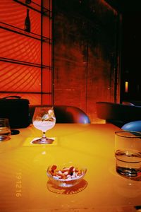 View of wine glasses on table in restaurant