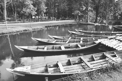 Panoramic view of boats moored in lake